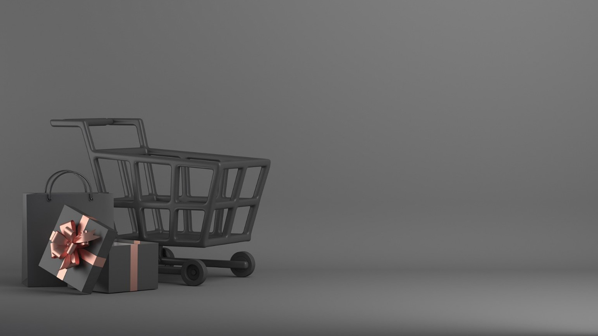 Gifts and trolley on a black background, black Friday concept