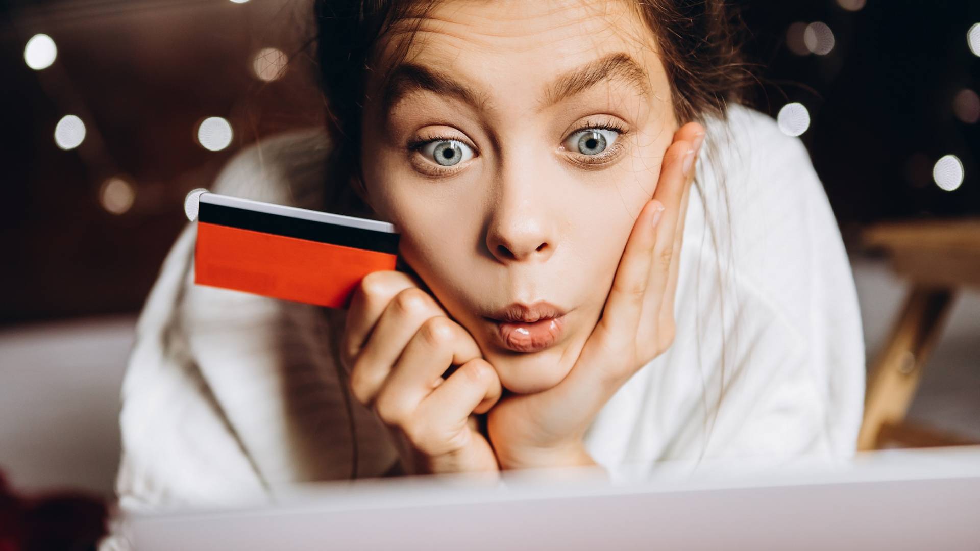 Young woman enjoying shopping online